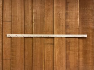 8' long Shaker Peg Rail with 12 Shaker Pegs